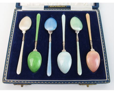 A cased set of six silver and enamel coffee spoons by H Clifford Davis Limited, Birmingham 1961, each spoon with different co