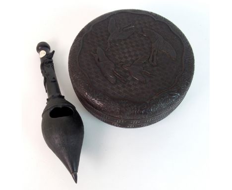 A Chinese bronze opium measure cast with a Kylin above a pierced nest ring handle, 25cm high and a lacquered circular box dec