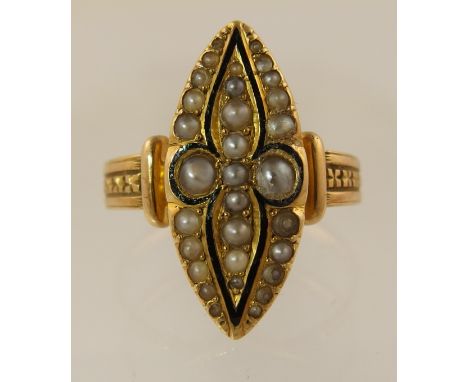 A Victorian mourning ring set with split pearls and a fine line of black enamel to the marquis shaped ring with engraved shou