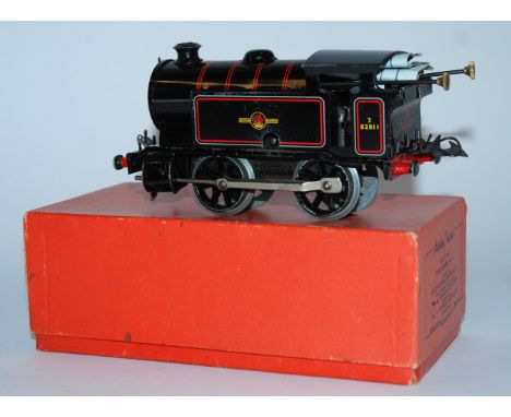 A Hornby "0" Gauge clockwork No.40 Reversing Tank Locomotive in original box, two Corgi models Chipperfields Circus truck, Ch