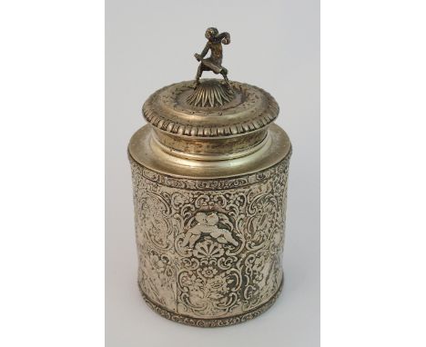 A continental silver tea caddy marked 900, of cylindrical form embossed with cherubs and lovebirds among foliage, the removab