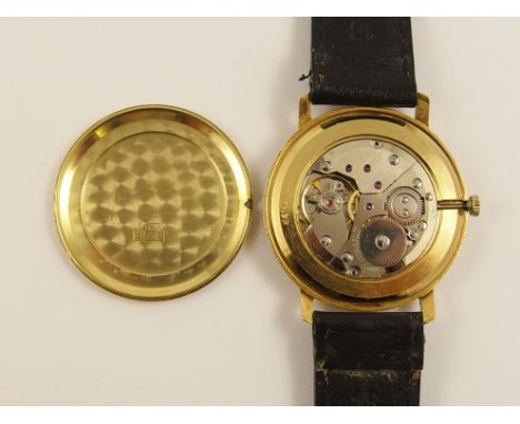 An 18ct cased gents watch celebrating the Queens Silver Jubilee, 17 jewel Swiss movement, the dial with a portrait of the Que