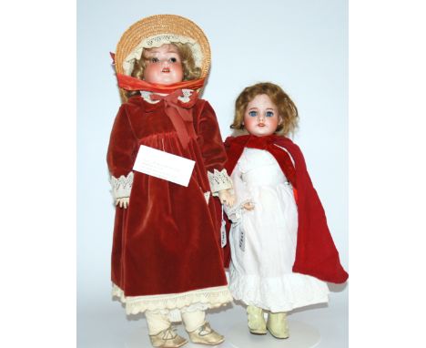 A SFBJ 60 bisque-headed doll with open and closed blue eyes, open mouth and painted features, the head impressed, D, SFBJ, 60