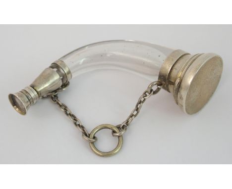 A novelty white metal and glass vinaigrette/scent bottle modelled as a hunting horn, the hinged lid marked with a registratio