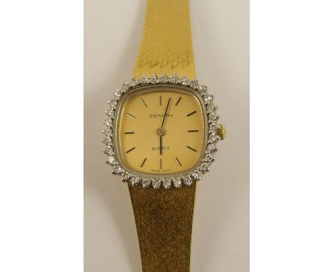 An 18ct yellow gold ladies Zenith quartz watch the bezel set with diamonds to an approx total of 0.34cts, with integral strap
