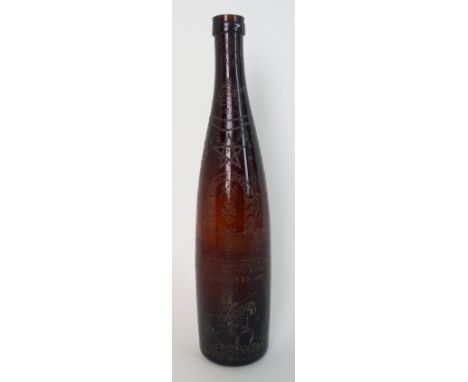 A Victorian Masonic stipple engraved wine bottle engraved with numerous symbols, mottos and icons, marked by W R Mantle, Live