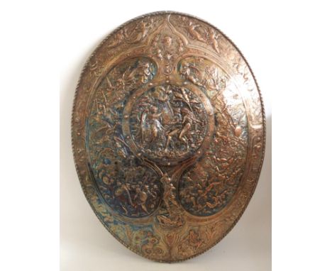An exceptional 19th Century Elkington & Company oval shield depicting biblical scenes from Genesis, the central circular pane