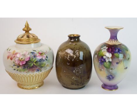 A group of Royal Worcester vases; a Worcester vase painted by M Blake and decorated with purple, white and burgundy violas on