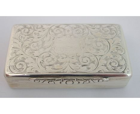 A silver snuff box maker's marks B & W, Birmingham 1840, of rectangular shape, the hinged cover with foliate engraving and a 