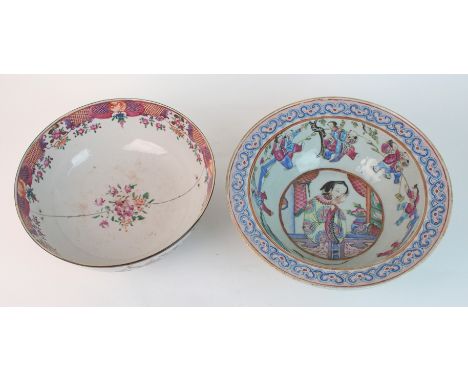 A Canton famille rose basin painted with a roundel of a beauty surrounded by children playing beneath a ruji border, 29.5cm d