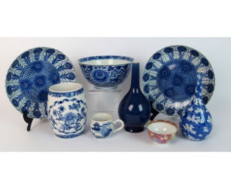A Chinese export blue and white mug painted with flowers, (repaired), 13cm high, bowl painted with chrysanthemums, (cracked),