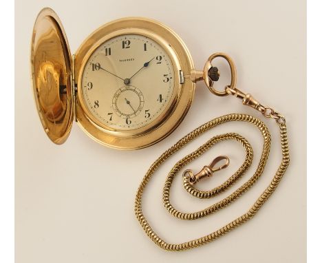 A 14ct gold Tavannes slim pocket watch with machine and hand engraved case, silvered dial with subsidiary seconds dial all wi