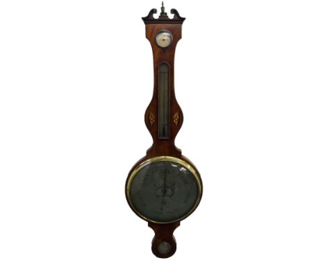 A George III mahogany wheel barometer and thermometer with shell inlaid medallions beneath a broken scroll and divided by urn