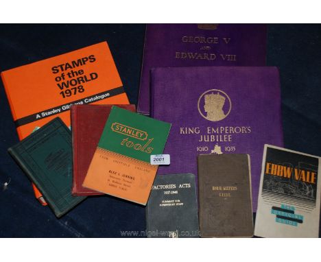 A box of books containing Royalty stamps of the World, Stanley Tools, etc.
