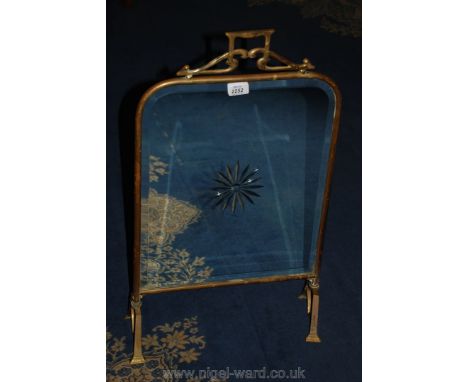 A Brass mirrored Firescreen.