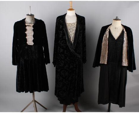 A 1920s soft black velvet dress with pink and white beaded detail; with a 1930s black georgette and lace dress, a black velve