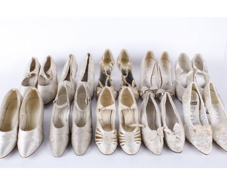Ten pairs of antique and vintage bridal shoes, comprising: Edwardian shoes, early 20th century ivory silk shoes, 1920s satin 