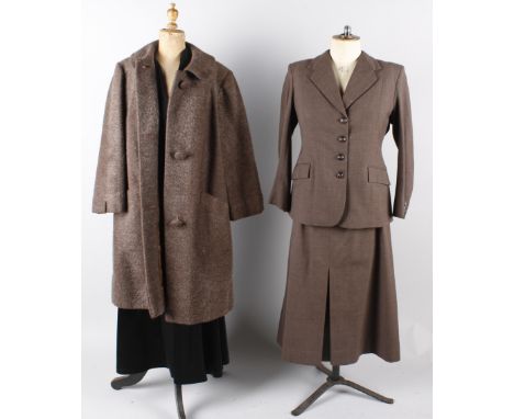 A 1940s John Mahon of Huddersfield suit, together with a 1950s brown velvet jacket, a Maryon 1950s black wool and satin dress