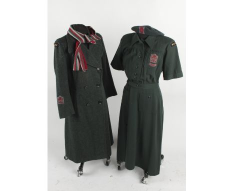 A Women's Voluntary Service/Civil Defence (Kent) green wool dress, (considerable moth damage); together with a green wool coa