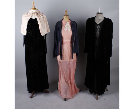 A 1930s black satin crepe evening gown with bead and diamante Art Deco style motif; together with a 1930s oyster pink velvet 