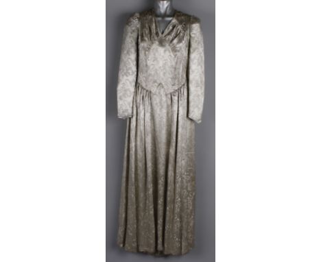 A 1970s Biba satin wedding coat; together with a 1940s cream wedding dress, a 1940s silver brocade wedding gown, a Grants of 