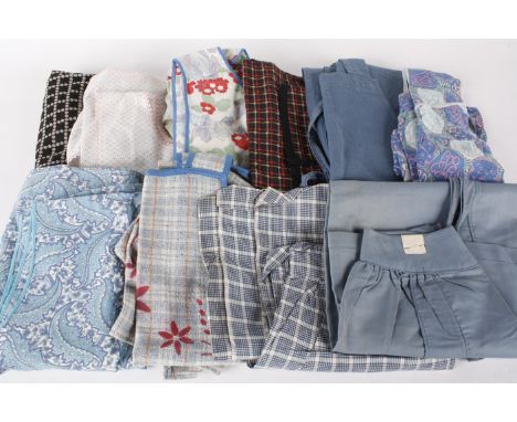A selection of ladies vintage aprons, including: cotton and linen workwear aprons, nurses aprons and floral examples, (qty).
