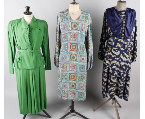 A 1920s wool coat with a striped lining; a 1930s floral chiffon dress and bolero (repairs), a 1930s navy floral crepe de chin