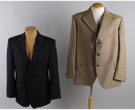 A quantity of vintage menswear, comprising: a Burberry raincoat, a Daks grey three-piece suit, a black pinstripe suit, a Daks