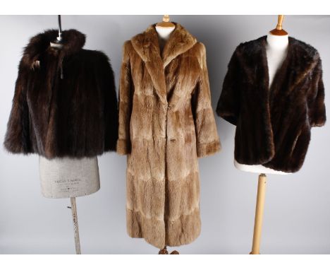 A musquash vintage fur coat by Dysons Furriers Ltd, 1, Commercial Street, Leeds; and a vintage fur stole, in a Marshall & Sne