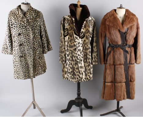 A 1960s Astrakhan coat; together with a pale mink jacket, a 1970s fur and leather coat, a grey leather 1970s coat with a fur 