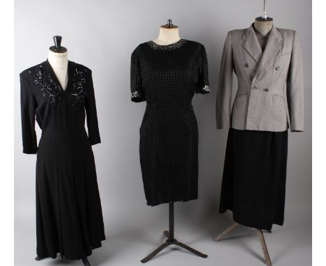 A 1930s blue silk velvet dress; together with a late 1940s black crepe dress with sequin detail, a 1940s grey two-piece suit,