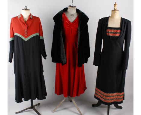 A 1930s red and black crepe dress; with a 1940s red velvet dress, a 1940s wool dress with red braid and gold decoration, 1950