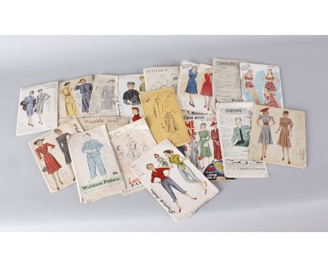 A large collection of vintage sewing patterns dating from the 1930s to the early 1960s, for ladies and children, including: l