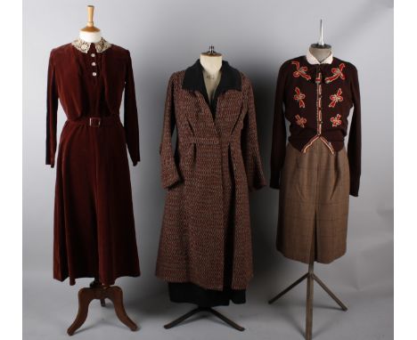 A 1940s russet brown velvet dress with bolero and lace collar; with a 1920s black wool coat with fur collar, a Harvey Nichols