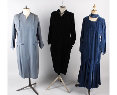 A 1920s slate grey embroidered jacket; with a 1920s blue wool dress, a 1930s blue velvet dress, a 1940s two-piece blue suit, 