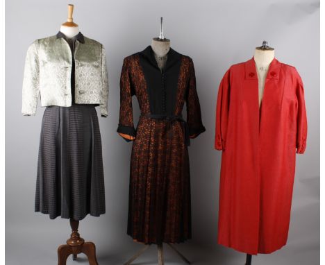 A 1940s russet coloured dress with bead decoration to the collar, a late 1940s black lace over orange satin dress, a grey pan