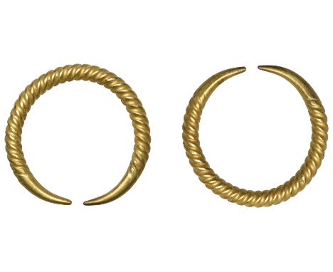 First Millennium BC, Ring Money, a solid penannular cable-twist gold band of plain metal with finely tapered ends, 3.49g, 21m