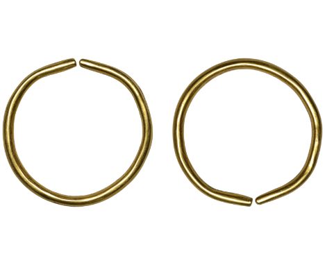 First Millennium BC, Ring Money, a large penannular smooth gold band of plain metal, folded and shaped with bluntly cut ends,