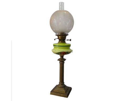 An antique brass corinthian column Oil Lamp, painted Bohemian style glass reservoir, stamped 'British Made', H 64 cm. 