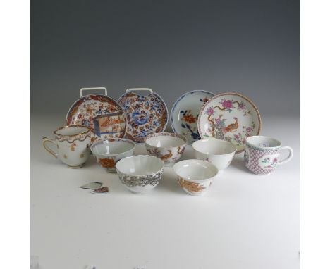 A 19thC Chinese famille rose porcelain Teabowl and Saucer, finely decorated in colourful enamels of a peacock amonst foliage,