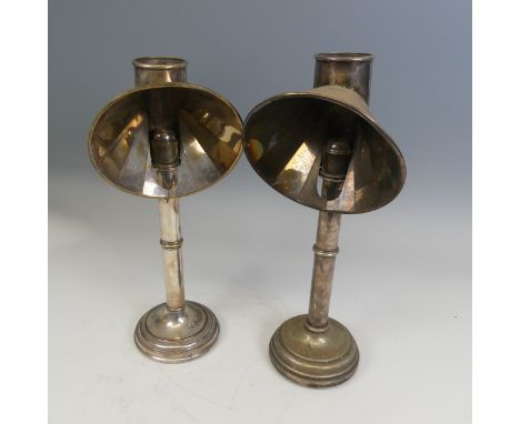 A Victorian silver plated student's candle&nbsp; Lamp, with spring-loaded candlesticks and a swiveling reflector hood, H 41 c