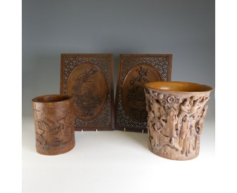 A Chinese carved bamboo Brush Pot, of cylindrical form, H 16.5cm, together with a pair of Chinese pierced wooden Panels, with