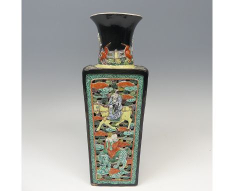 An antique Chinese famille verte biscuit Vase, of tapering square with flared rim, restored, profusely decorated, coloured an