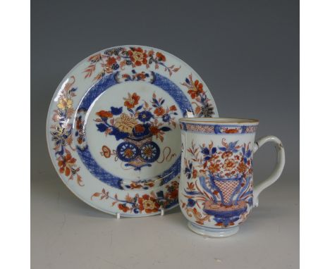 A mid 18thC Chinese imari Baluster Mug, of typical form, central depiction of ornate flower basket, crack and chip to handle,