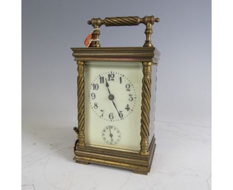 An early 20th century gilt-brass French Carriage Clock, with lever escapement and alarm, movement stamped 'made in France', H