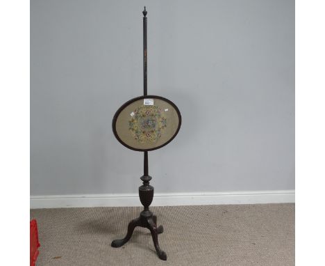 A 19th century mahogany pole Screen, embroidered panel raised on cabriole tripod base, H 154 cm.&nbsp; 