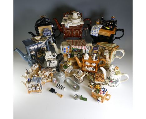 A collection of Paul Cardew ceramic Teapots, including ; ''The Lilliput Lane market stall'', ''a Special 'Cat' collaboration 