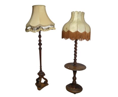 An early 20th century mahogany standard Lamp, with reeded and foliate carved column raised on tripod base, H 142.5 cm, togeth