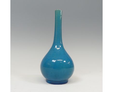 A small 19thC Chinese monochrome ovoid Bottle Vase, in shades of blue with long slender neck and potted foot, two chips to fo