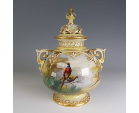 A Hadley ware Royal Worcester porcelain Pot Pourri Urn, decorated with finely handpainted depictions of game birds amongst fo